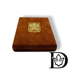 Closed velvet case of the Vatican Mint with papal coat of arms