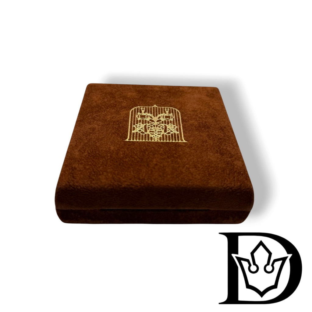 Closed velvet case of the Vatican Mint, front view
